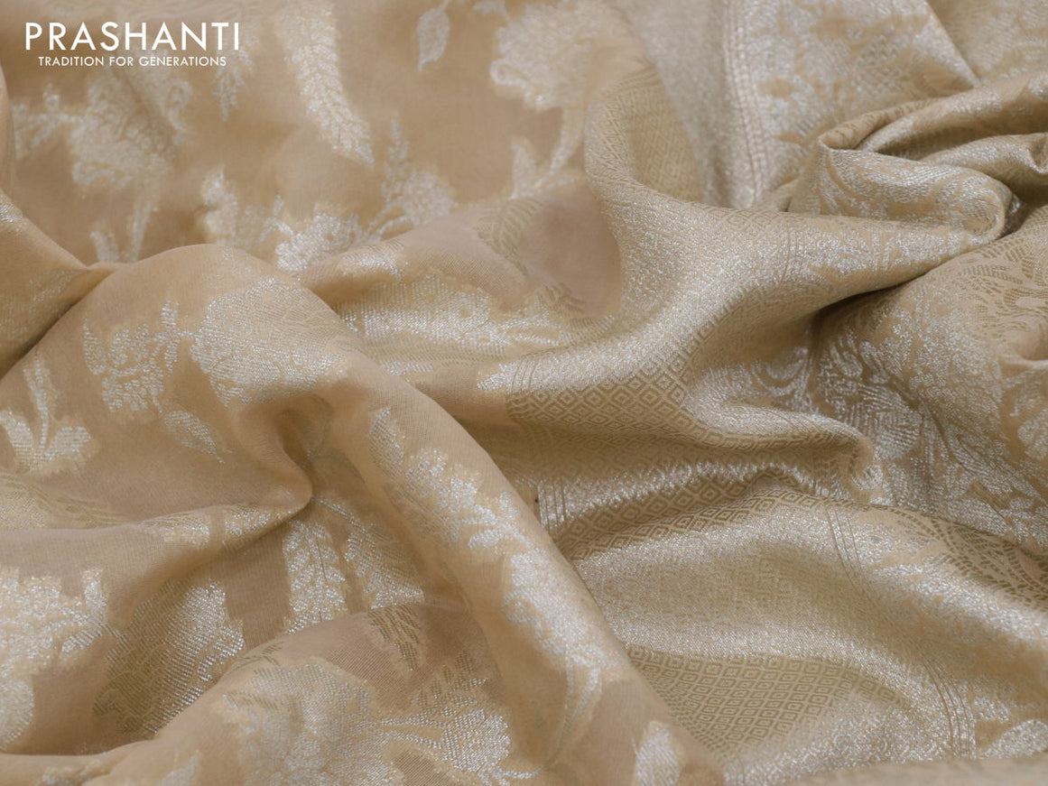 Banarasi cotton saree sandal with allover silver zari floral weaves and zari woven embroidery work border