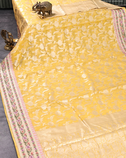 Banarasi cotton saree yellow with allover silver zari floral weaves and zari woven embroidery work border