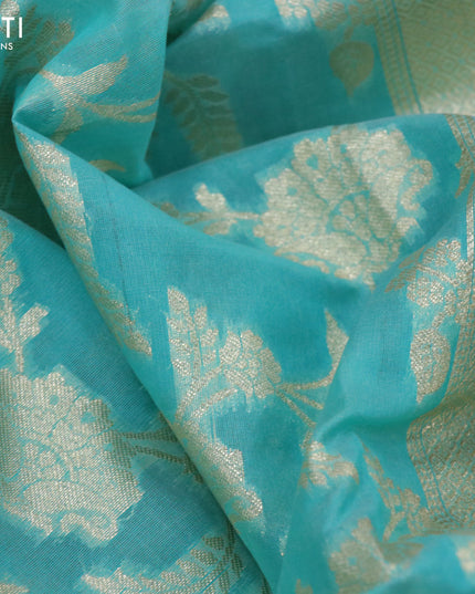Banarasi cotton saree teal blue with allover silver zari floral weaves and zari woven embroidery work border