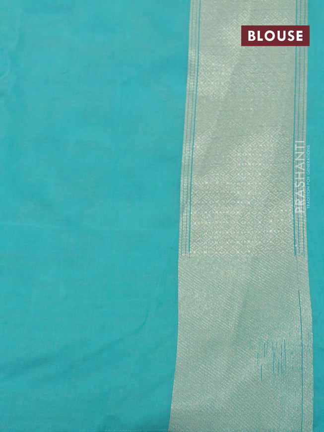 Banarasi cotton saree teal blue with allover silver zari floral weaves and zari woven embroidery work border