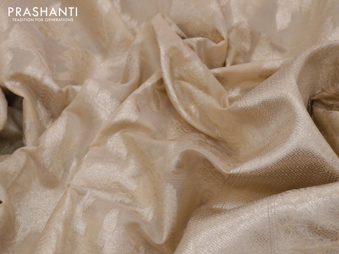 Banarasi cotton saree sandal with allover zari floral weaves and zari woven embroidery work border