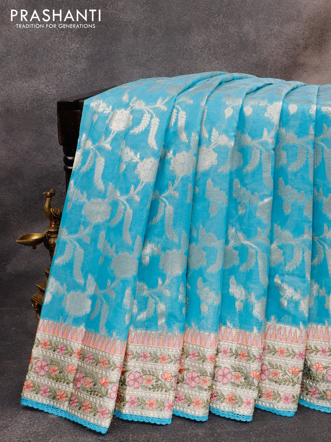 Banarasi cotton saree light blue with allover silver zari floral weaves and zari woven embroidery work border