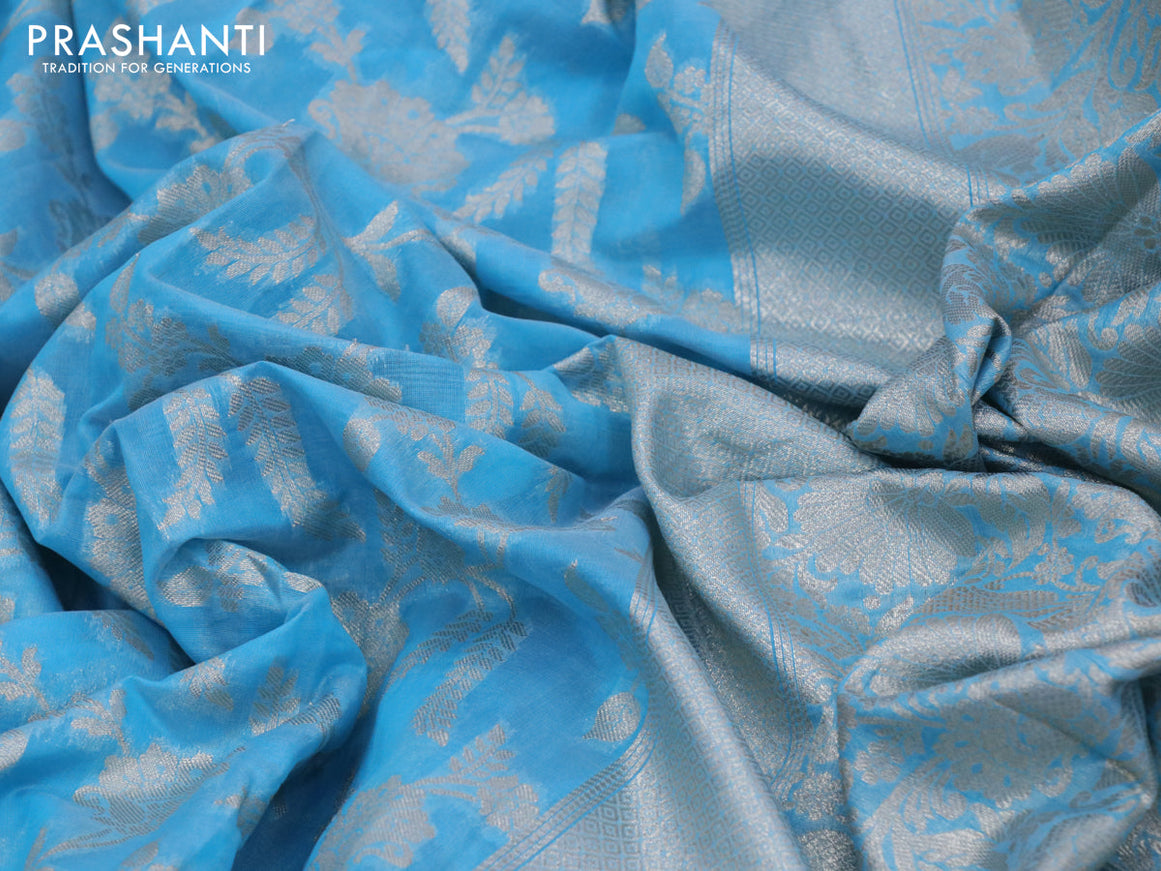 Banarasi cotton saree light blue with allover silver zari floral weaves and zari woven embroidery work border