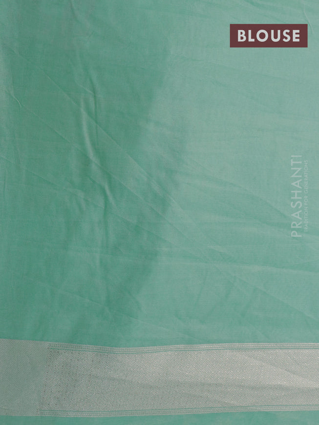 Banarasi cotton saree pastel green with allover silver zari floral weaves and zari woven embroidery work border