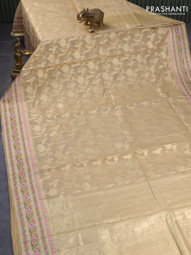 Banarasi cotton saree sandal with allover silver zari floral weaves and zari woven embroidery work border