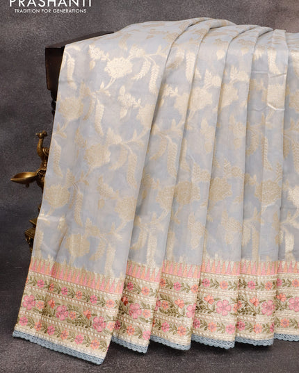 Banarasi cotton saree grey with allover silver zari floral weaves and zari woven embroidery work border