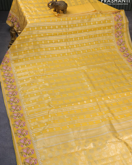 Banarasi cotton saree mango yellow with allover silver & gold zari butta weaves and floral embroidery border