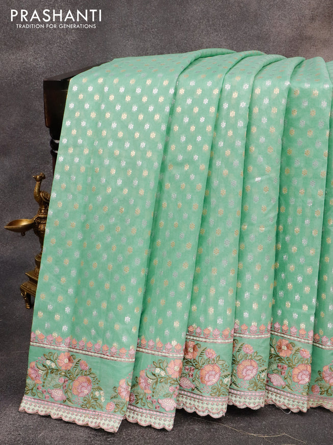 Banarasi cotton saree pastel green with allover silver & gold zari butta weaves and floral embroidery butta border