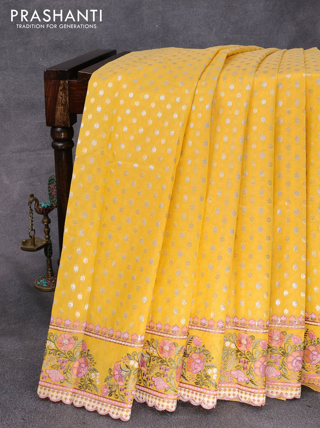 Banarasi cotton saree mango yellow with allover silver & gold zari butta weaves and floral embroidery butta border