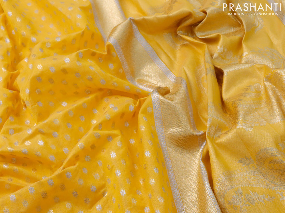 Banarasi cotton saree mango yellow with allover silver & gold zari butta weaves and floral embroidery butta border