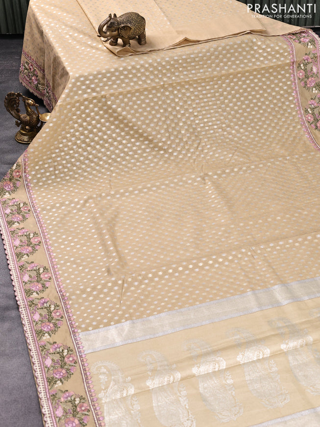 Banarasi cotton saree sandal with allover silver & gold zari butta weaves and floral embroidery butta border