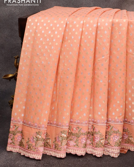 Banarasi cotton saree peach orange with allover silver & gold zari butta weaves and floral embroidery butta border