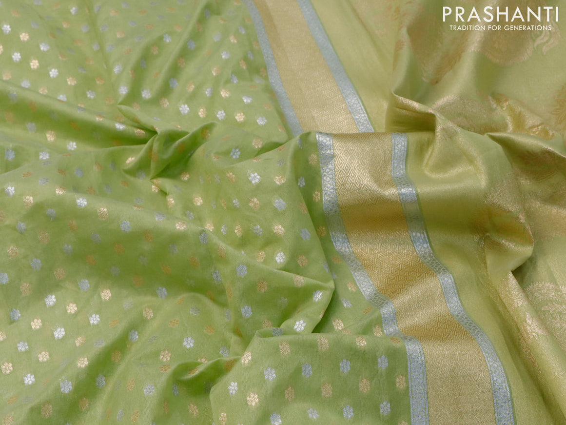 Banarasi cotton saree pista green with allover silver & gold zari butta weaves and floral embroidery butta border