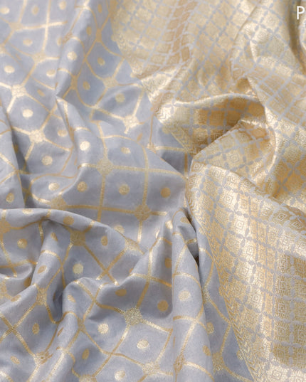 Banarasi cotton saree grey with allover zari weaves and zari woven embroidery work border
