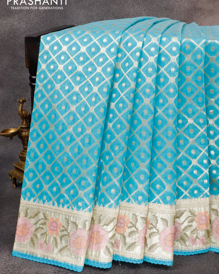 Banarasi cotton saree light blue with allover zari weaves and zari woven embroidery work border