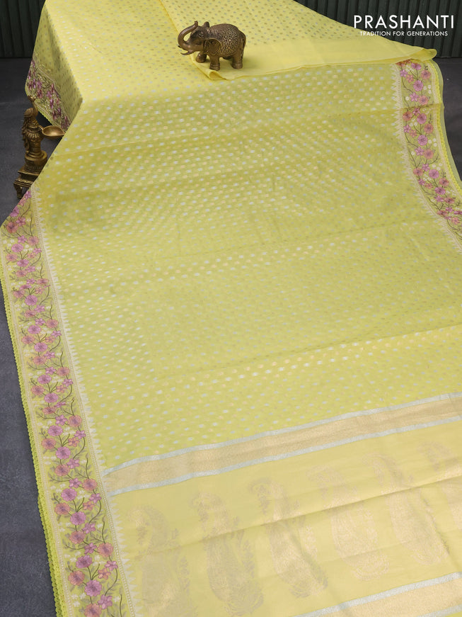 Banarasi cotton saree pale yellow with allover silver & gold zari woven butta weaves and floral embroidery border