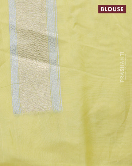 Banarasi cotton saree pale yellow with allover silver & gold zari woven butta weaves and floral embroidery border