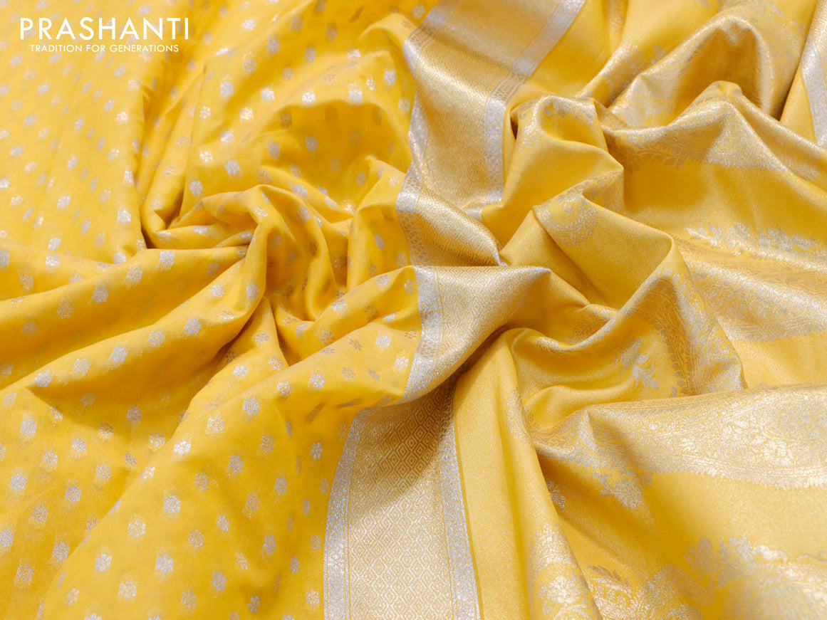 Banarasi cotton saree mango yellow with allover silver & gold zari woven butta weaves and floral embroidery border