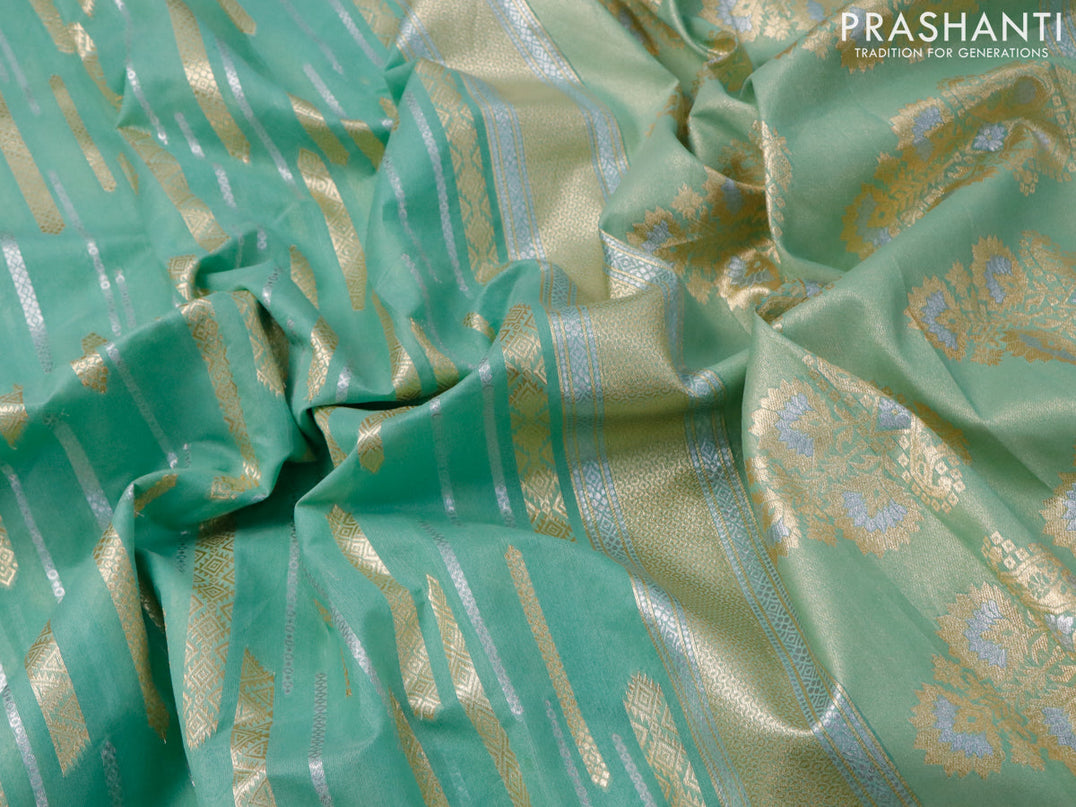 Banarasi cotton saree teal green shade with allover silver & gold zari woven butta weaves and floral embroidery border