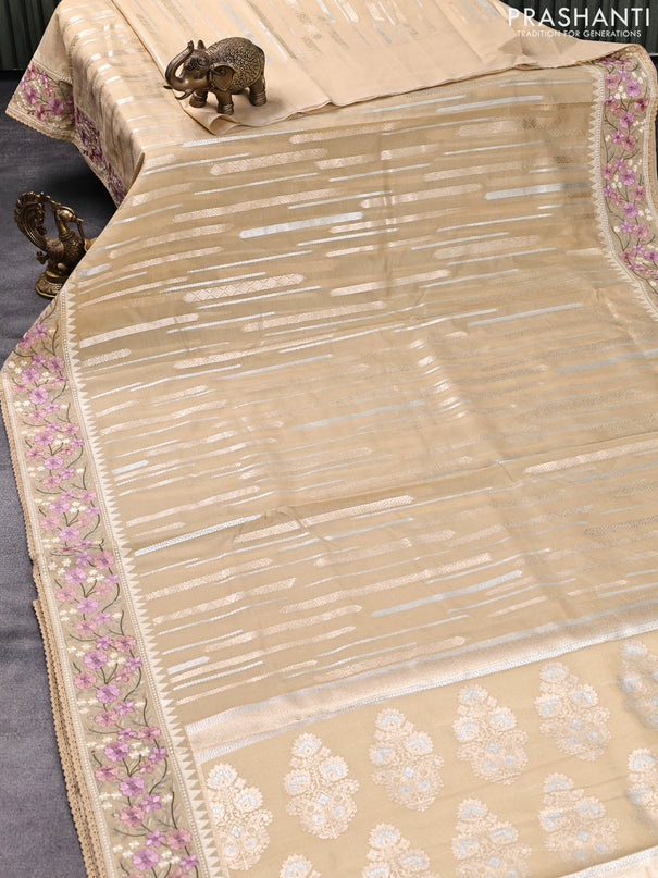 Banarasi cotton saree sandal with allover silver & gold zari woven butta weaves and floral embroidery border