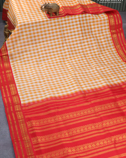 Silk cotton saree off white mustard yellow and red with allover paalum pazhamum checks and zari woven korvai border