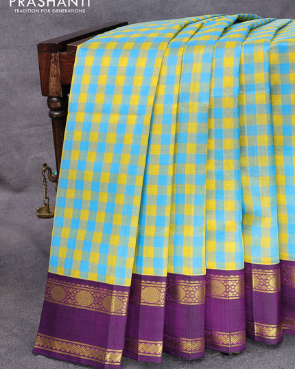 Silk cotton saree yellow blue and violet with allover paalum pazhamum checks and rettapet zari woven korvai border
