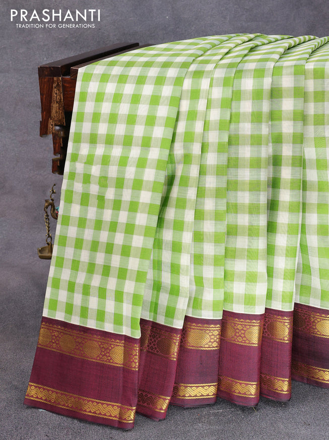 Silk cotton saree off white green and wine shade with allover paalum pazhamum checks and rettapet zari woven korvai border