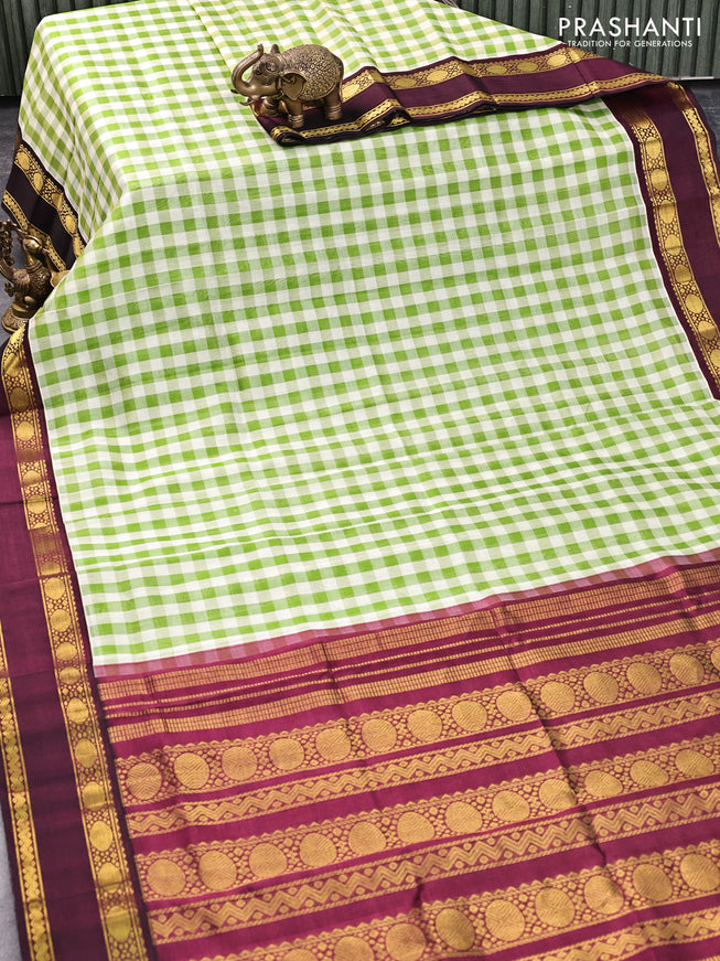 Silk cotton saree off white green and wine shade with allover paalum pazhamum checks and rettapet zari woven korvai border