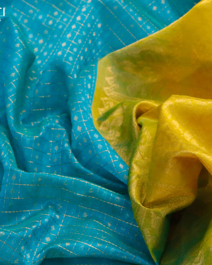Kuppadam silk cotton saree light blue and yellow with allover zari checks & buttas and temple design zari woven border