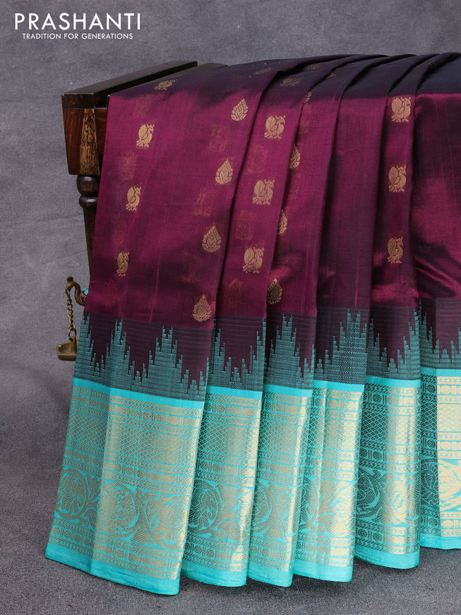 Kuppadam silk cotton saree wine shade and teal blue with allover zari woven buttas and temple design zari woven border