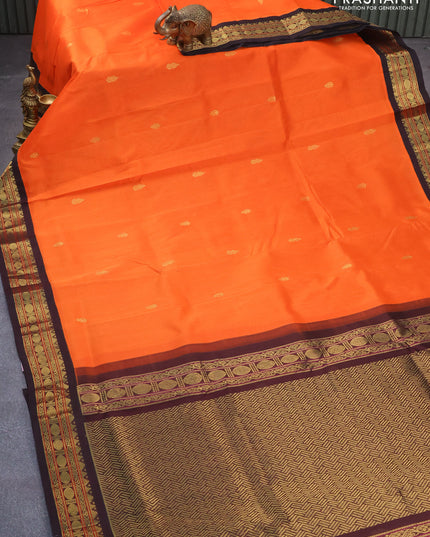 Silk cotton saree orange and coffee brown with zari woven buttas and zari woven korvai border