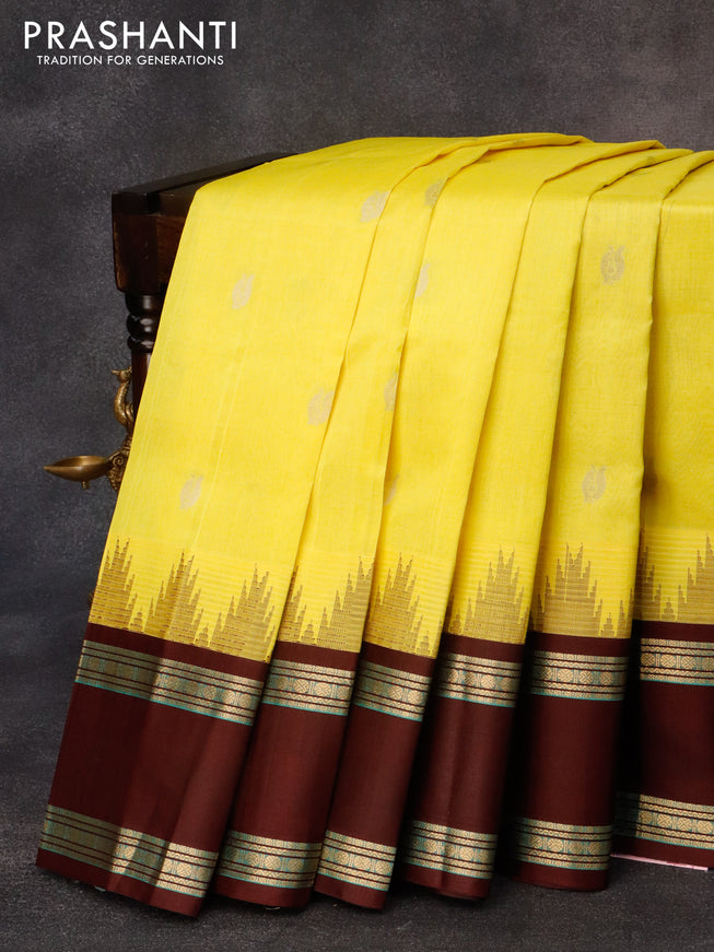 Kuppadam silk cotton saree lime yellow and coffee brown with annam zari woven buttas and temple design rettapet zari woven border