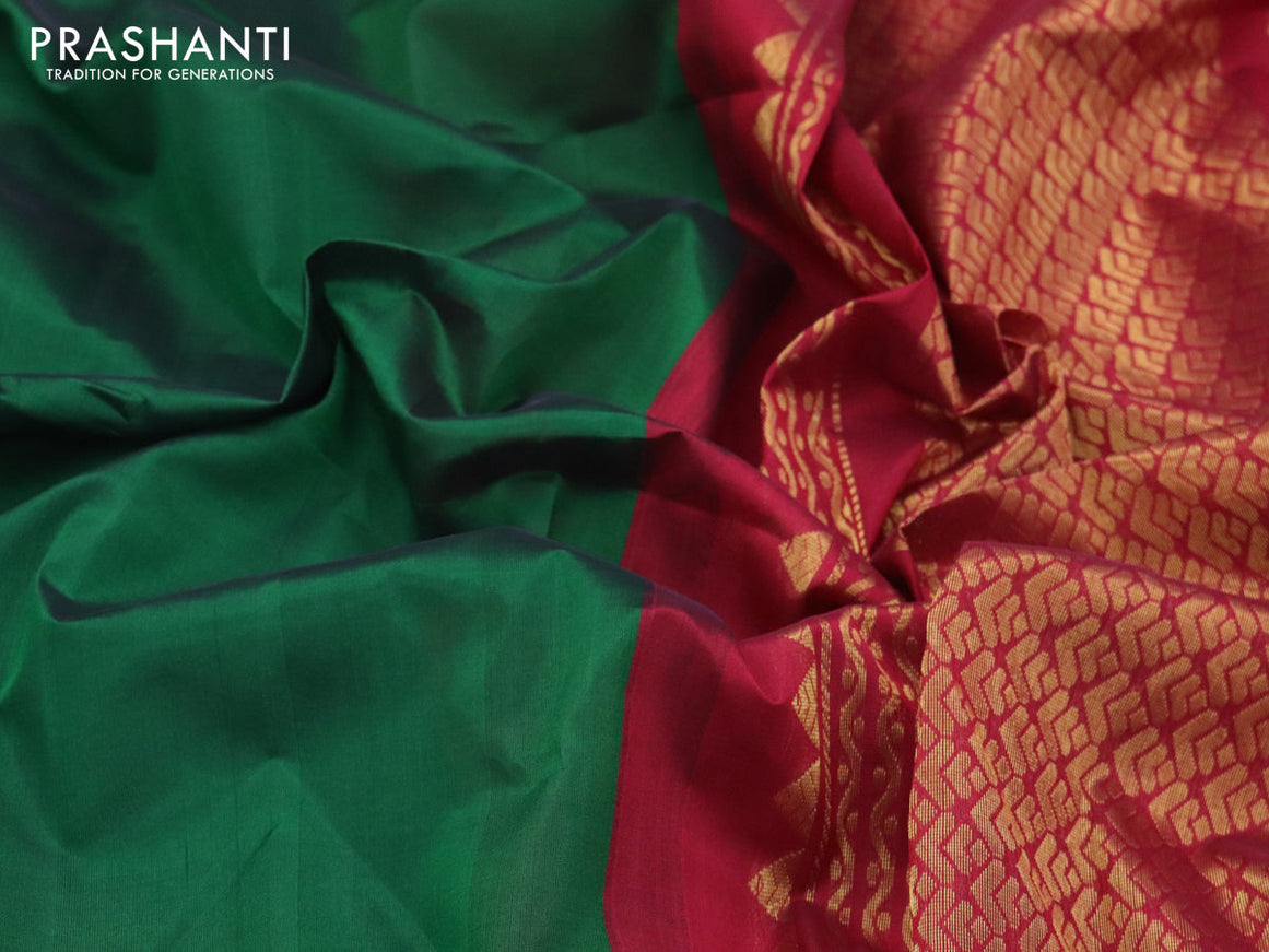 Kuppadam silk cotton saree green and maroon with plain body and zari woven border