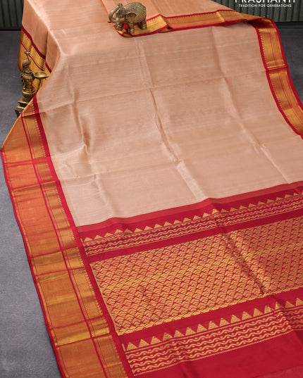 Kuppadam silk cotton saree pastel peach and maroon with plain body and zari woven border