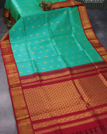 Kuppadam silk cotton saree teal green and maroon with annam zari woven buttas and rich zari woven border