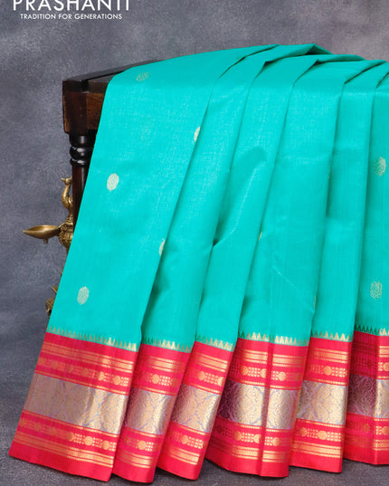 Kuppadam silk cotton saree teal blue shade and pink with zari woven buttas and rich zari woven border