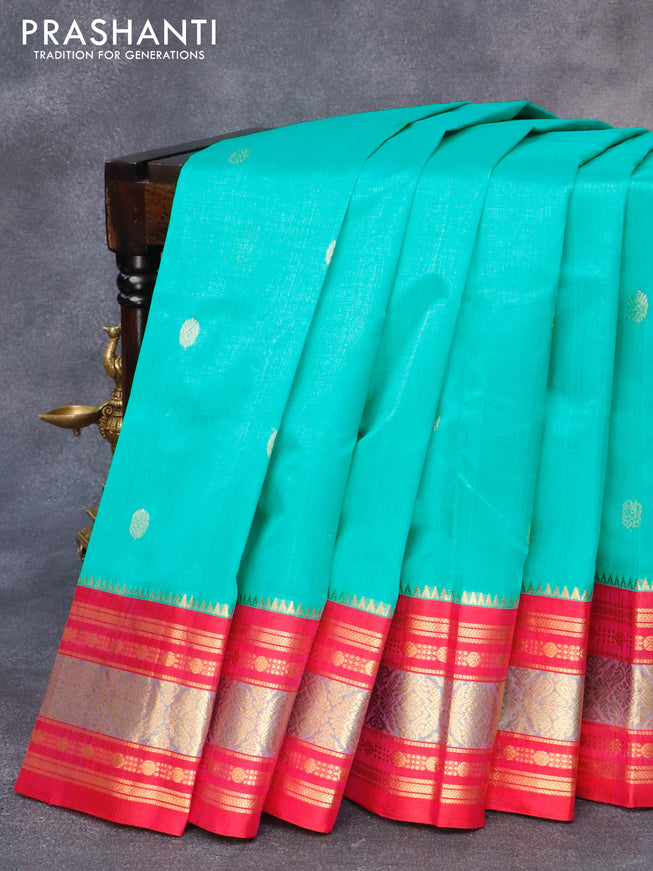 Kuppadam silk cotton saree teal blue shade and pink with zari woven buttas and rich zari woven border