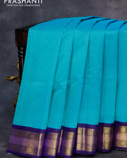 Kuppadam silk cotton saree light blue and blue with plain body and zari woven border