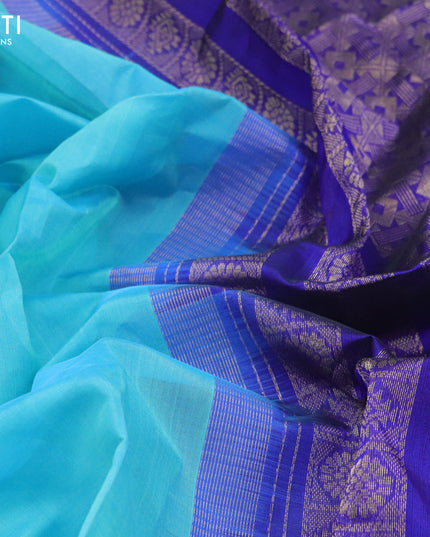 Kuppadam silk cotton saree light blue and blue with plain body and zari woven border