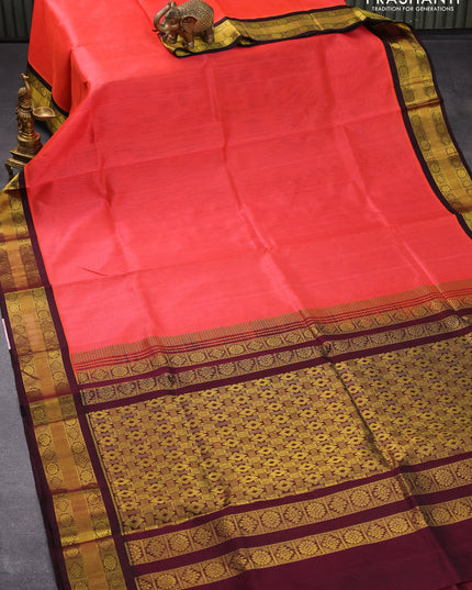 Kuppadam silk cotton saree pinkish orange and wine shade with plain body and zari woven border