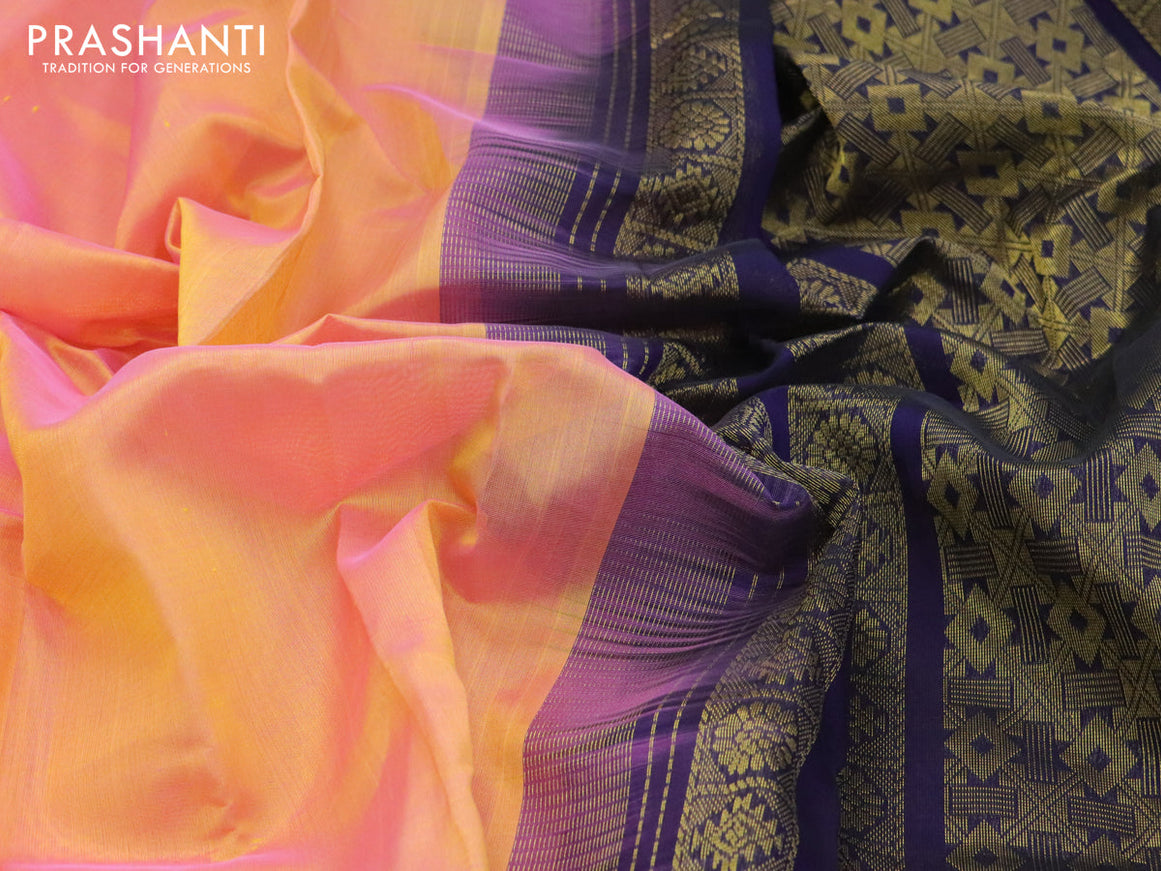 Kuppadam silk cotton saree dual shade of yellowish pink and navy blue with plain body and zari woven border