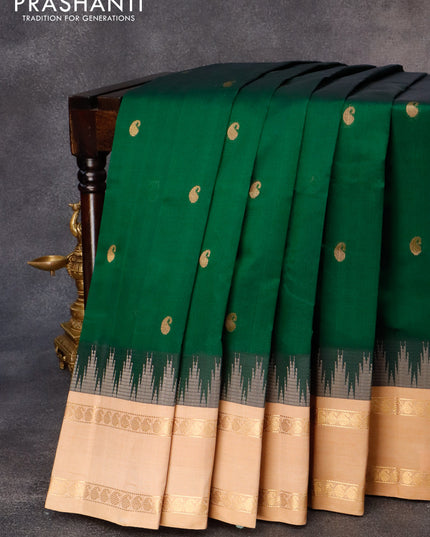 Kuppadam silk cotton saree green and sandal with paisley zari woven buttas and temple design rettapet zari woven border