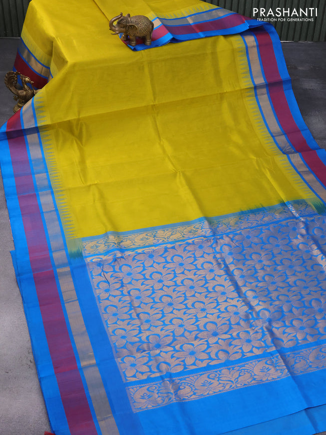 Kuppadam silk cotton saree lime green and cs blue with plain body and temple design zari woven simple border