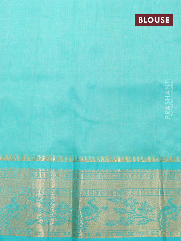 Kuppadam silk cotton saree sandal and teal blue with allover zari checked pattern and zari woven peacock border