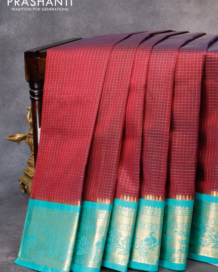 Kuppadam silk cotton saree maroon and teal blue with allover zari checked pattern and zari woven peacock border