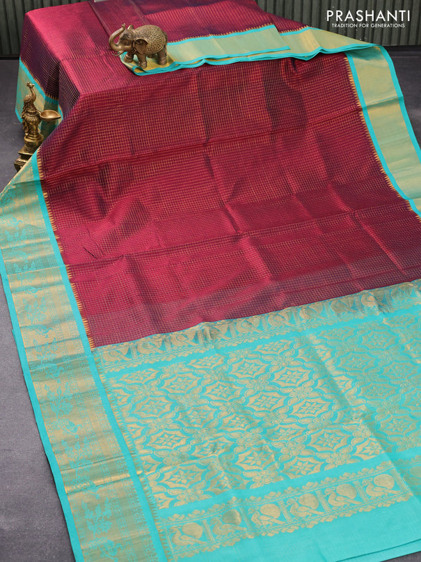 Kuppadam silk cotton saree maroon and teal blue with allover zari checked pattern and zari woven peacock border