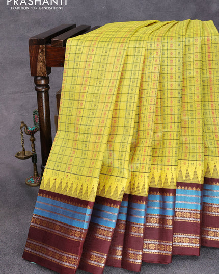 Kuppadam silk cotton saree lime yellow and coffee brown with allover thread checks & buttas and temple design zari woven border