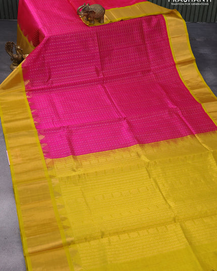 Kuppadam silk cotton saree magenta pink and lime yellow with allover zari checks & buttas and temple design zari woven border