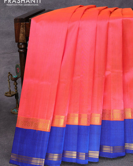 Kuppadam silk cotton saree peach orange and blue with plain body and rettapet zari woven border