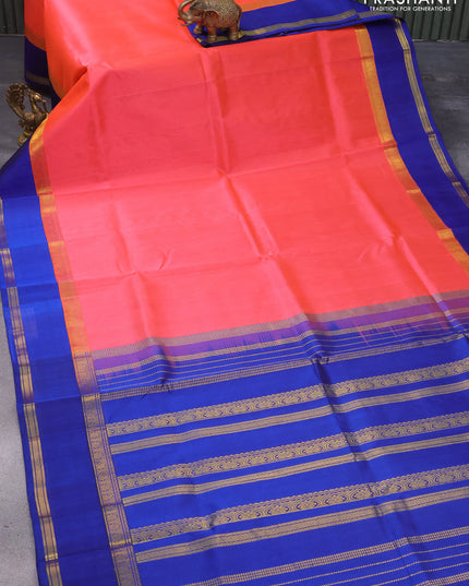 Kuppadam silk cotton saree peach orange and blue with plain body and rettapet zari woven border